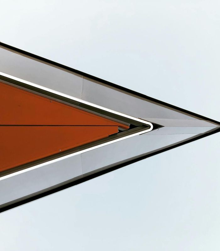 Abstract orange and dark grey wellness composition